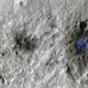 The meteoroid exploded into three pieces upon entering the atmosphere, leaving behind at least three craters, seen here highlighted in blue.